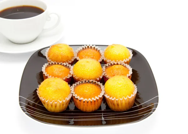 stock image Cakes on a plate , isolated over white