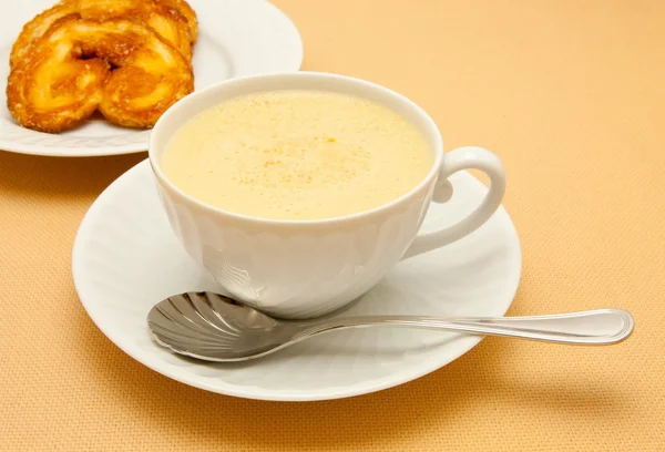 Closeup of coffee with milk in white cup — Stock Photo, Image