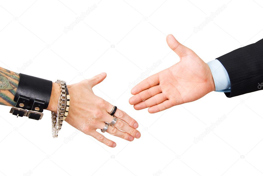 Punk man and businessman hand shake
