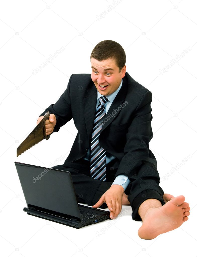 Barefoot businessman saw laptop