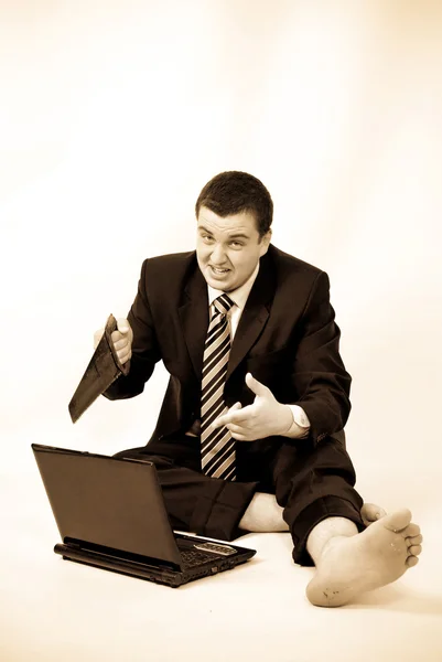 Businessman saw laptop in sepia style — Stock Photo, Image