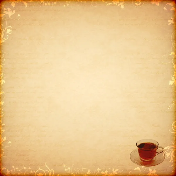 Цветочный древний отпечаток с чашкой чая — стоковое фото