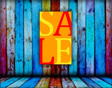 Sale Sign on Wood Background clipart