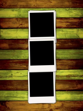 Blank Photos on Wood Background clipart