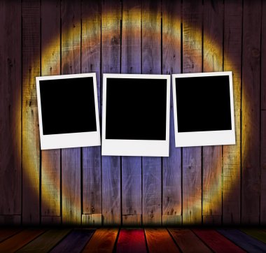 Blank Photos on Wooden Background clipart