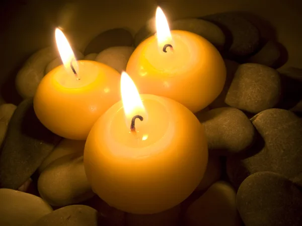 Burning Candles on Sea Stones — Stock Photo, Image