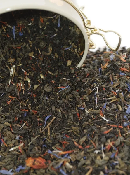 Mistura de chá verde, preto e flor — Fotografia de Stock