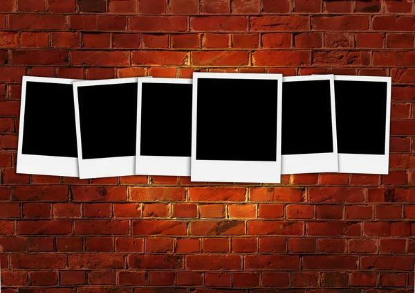 Six Blank Photos on Brick Background — Stock Photo, Image