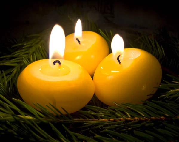 Burning Candles on Fir Tree Branches — Stock Photo, Image