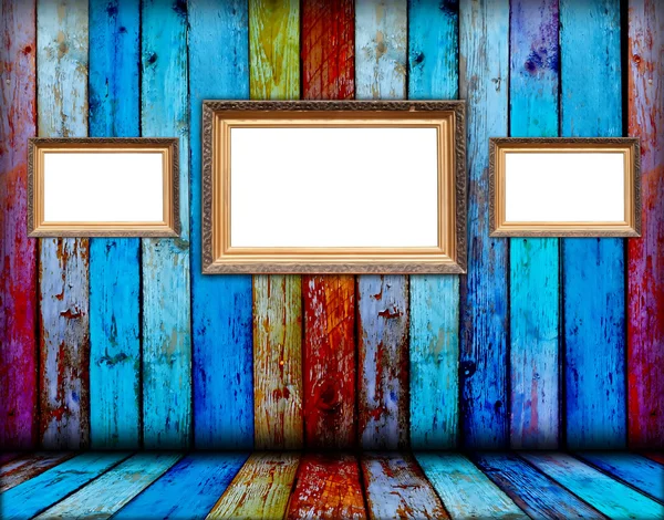 Tres marcos en blanco en habitación de madera — Foto de Stock