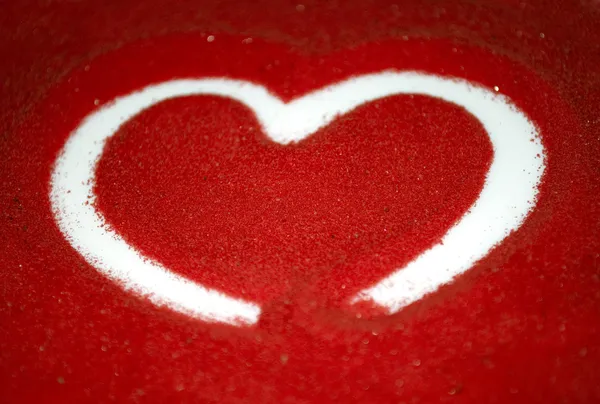 Corazón en arena roja — Foto de Stock