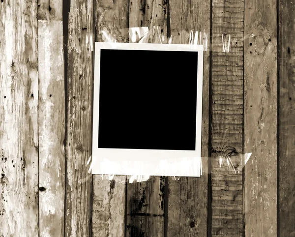 Foto en blanco sobre fondo de madera vintage — Foto de Stock