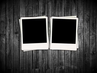 Two Blank Photos on Wood Background clipart
