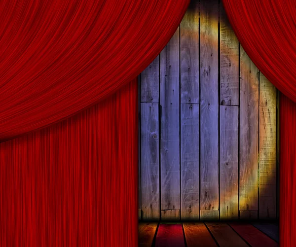 Estágio de madeira atrás da cortina vermelha — Fotografia de Stock