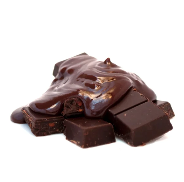 Geschmolzene Schokolade auf Schokotabletten — Stockfoto