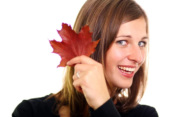 Beautiful young woman and maple leaves — Stock Photo, Image
