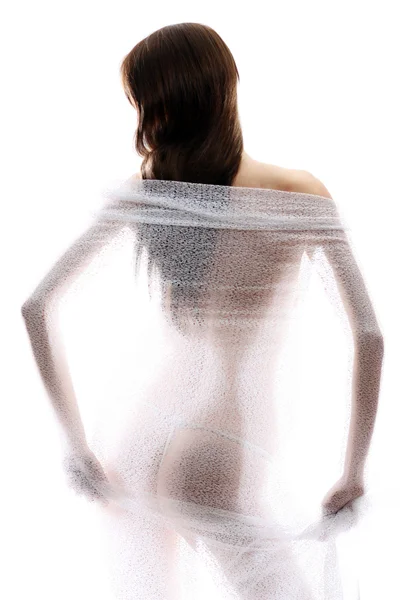 Ανώνυμος γυμνό κορίτσι silhouetted πίσω από την καθαρή πανί — Φωτογραφία Αρχείου