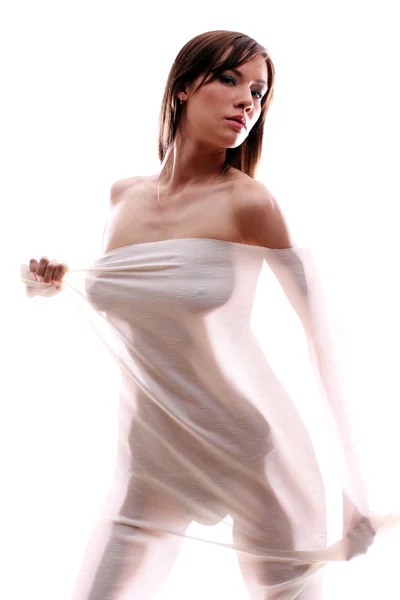 Anonymní nahé dívky siluetu za pouhou látkou — Stock fotografie