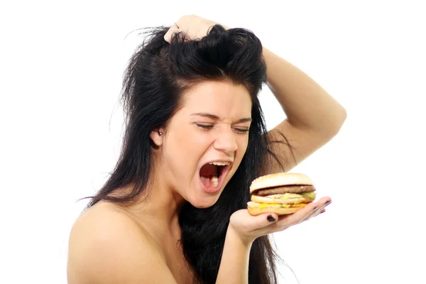 Vrouw hamburger eten — Stockfoto