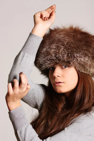 Woman in a furry hat — Stock Photo, Image