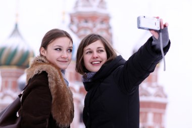 Tourists are photographed in Moscow