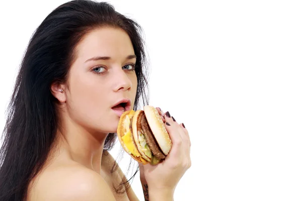 Vedere laterală a femeii care deține un sandwich — Fotografie, imagine de stoc