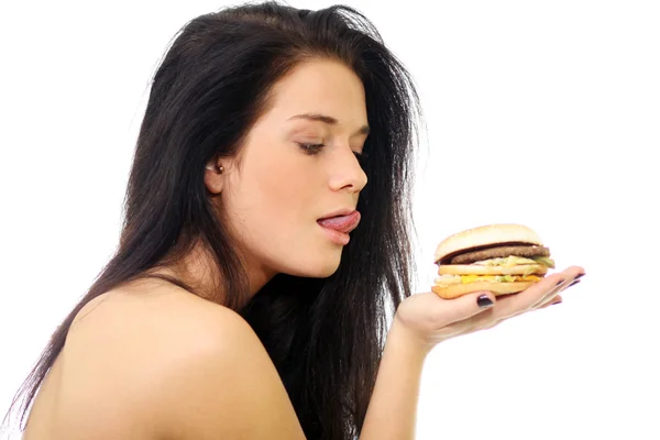 Vedere laterală a femeii care deține un sandwich — Fotografie, imagine de stoc