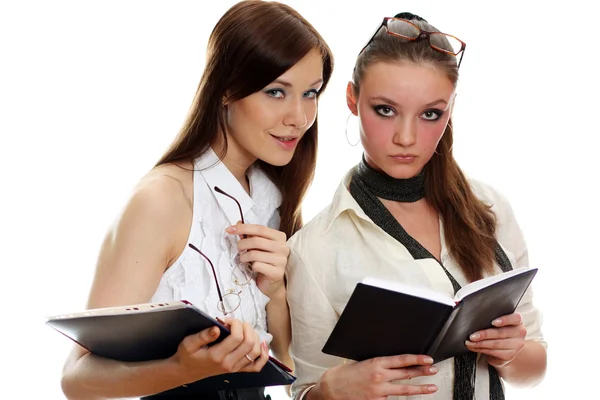Two young women reading books — Stock Photo, Image