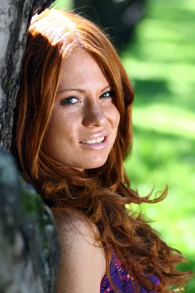 Red-hair girl in outdoor — Stock Photo, Image