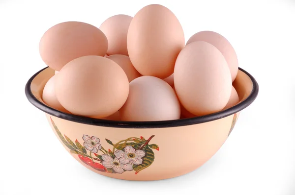 Chicken eggs are in a dish — Stock Photo, Image