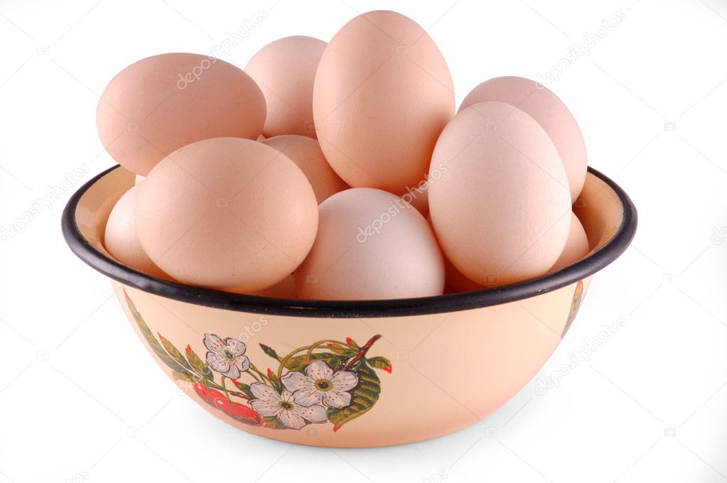 Chicken eggs are in a dish