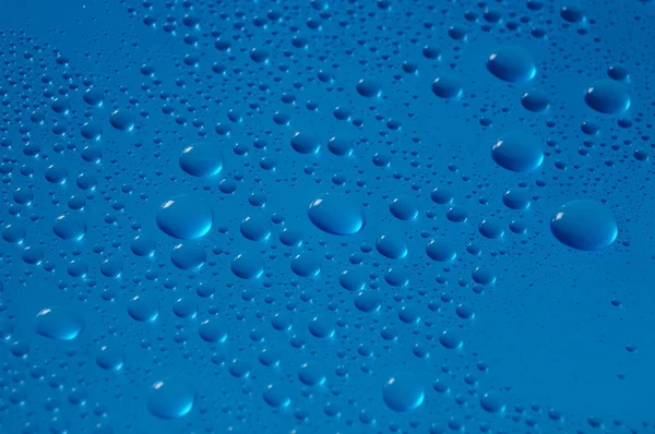 Vodní modré kapky — Stock fotografie