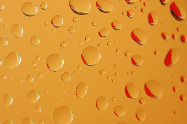 Vodní kapky oranžové — Stock fotografie