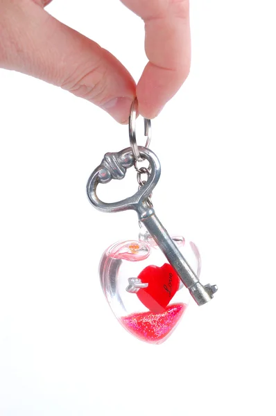 Coração vermelho com a chave — Fotografia de Stock