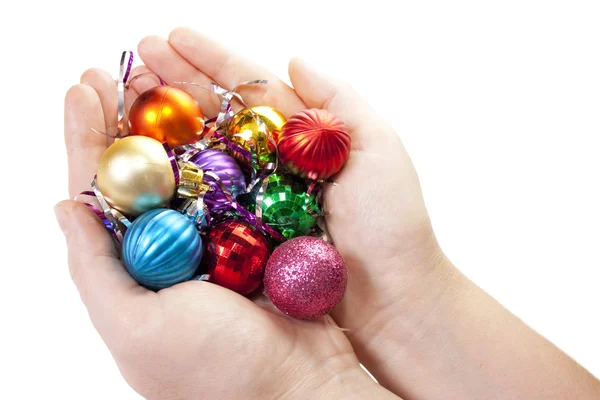 Rukou a Vánoční dekorace hračkyおもちゃの手とのクリスマスの装飾 — ストック写真