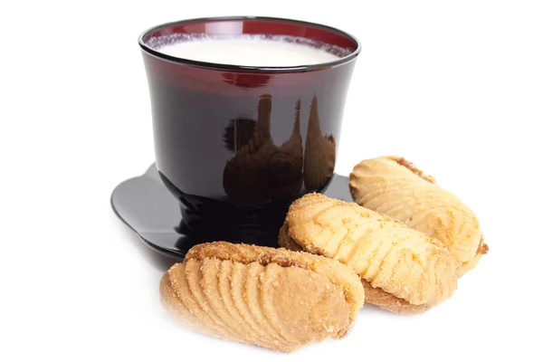 Cup of milk and tasty cookies — Stock Photo, Image
