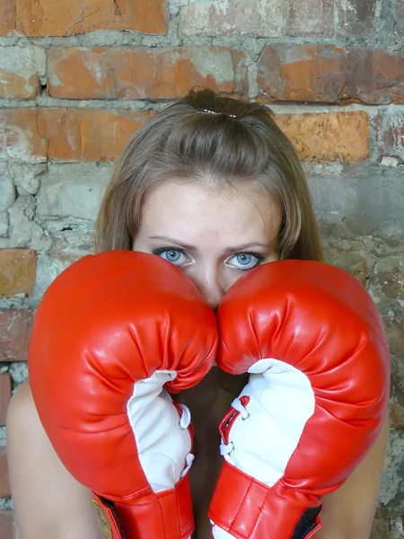 Girl in red boxing gloves — Stock Photo, Image
