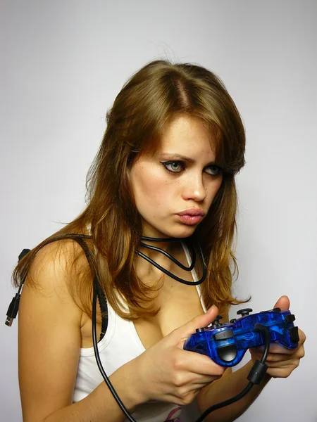 Attractive woman plays video game — Stock Photo, Image