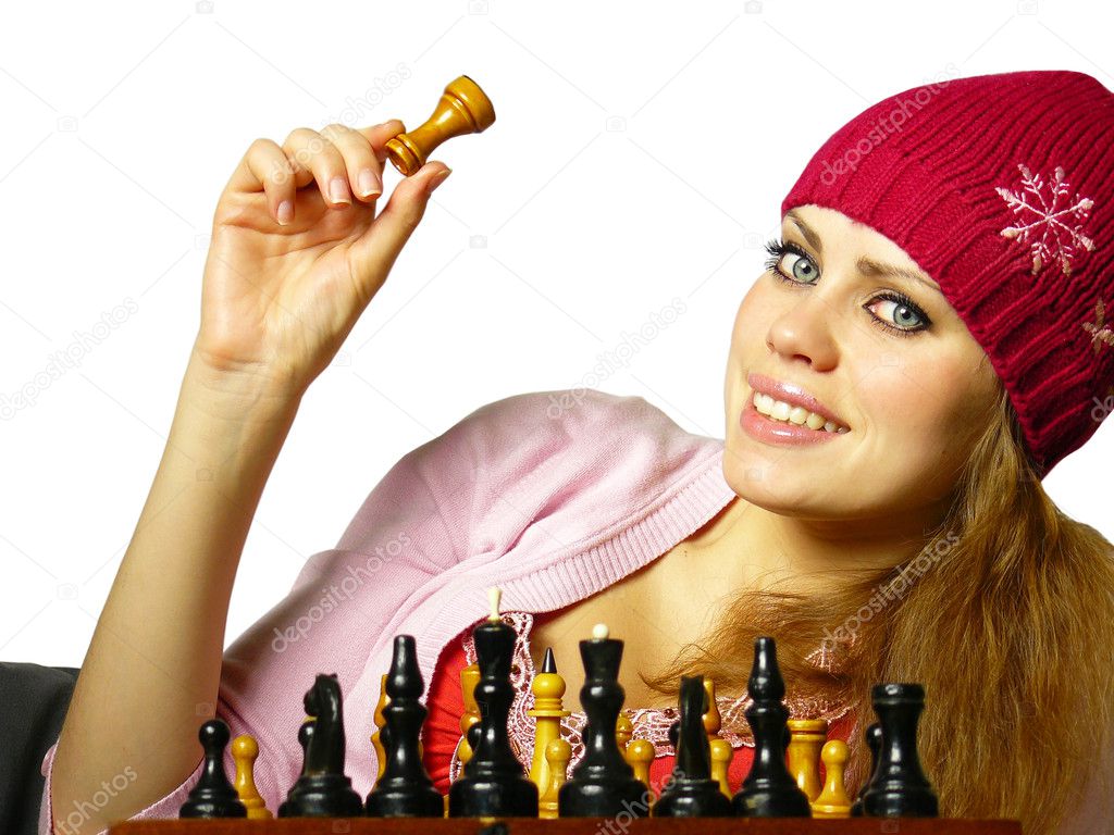 Girl plays chess on a white background