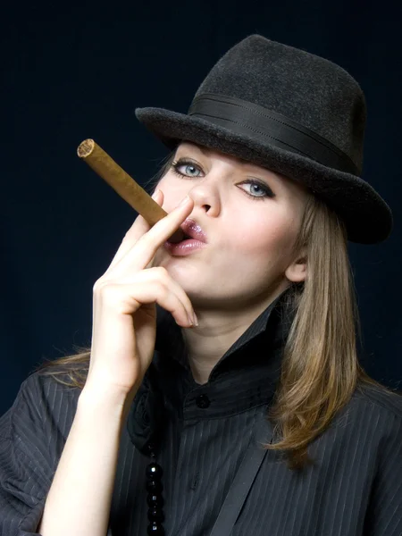 Lady in black and a cigar — Stock Photo, Image