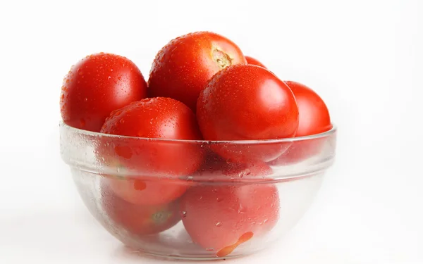 stock image Tomatoes are in a glass vase