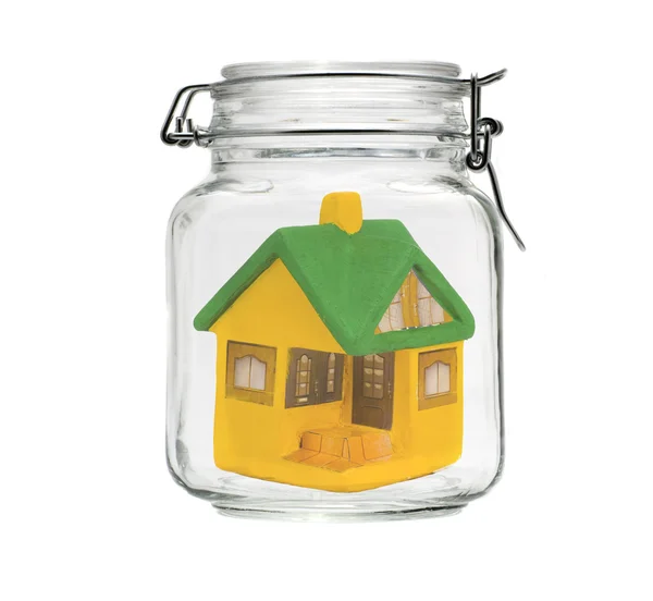 Small model house in jar — Stock Photo, Image