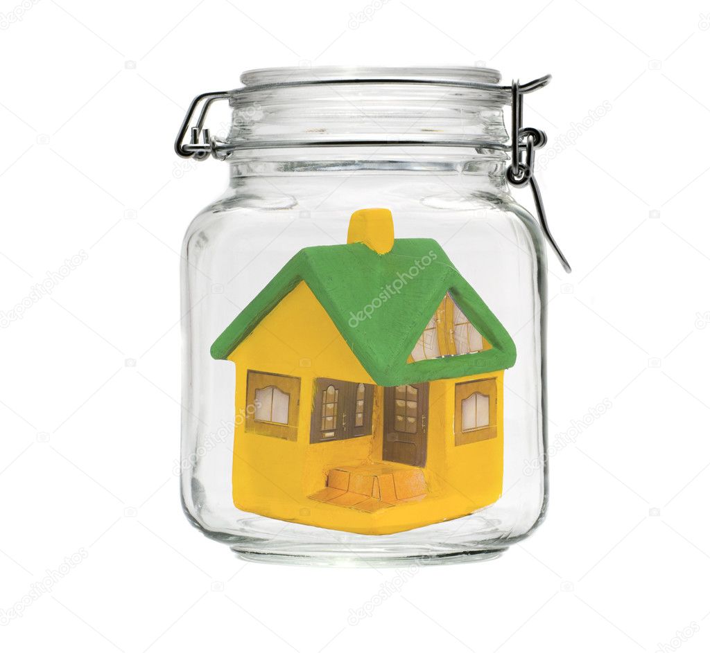 Small model house in jar