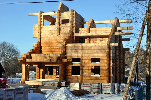 stock image Building of the new house from a bar