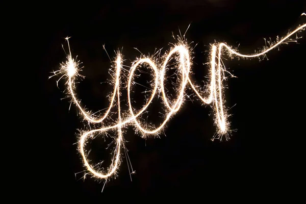 Word Year made by sparkler — Stock Photo, Image
