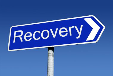 Signpost along the road to recovery. clipart