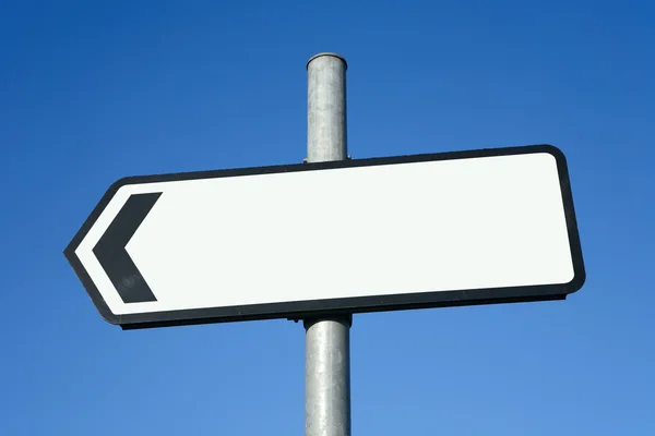Znak kierunek lewy z miejsca na tekst — Zdjęcie stockowe