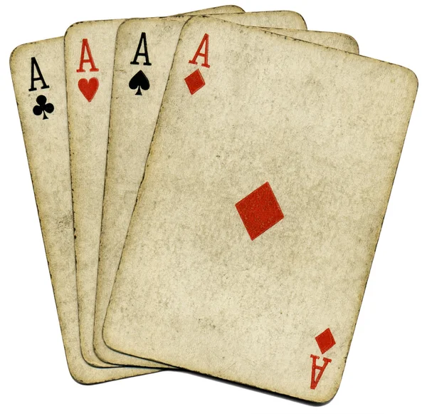 Quatro velhos ases sujos cartas de poker, isolar — Fotografia de Stock