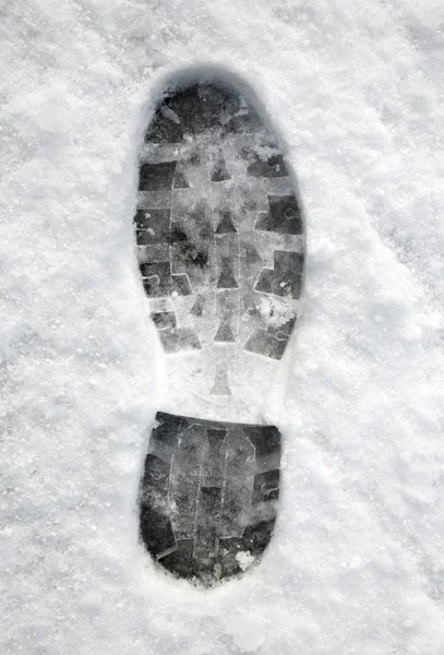 Κοντινό πλάνο ενός αποτυπώματος στο χιόνι. — Φωτογραφία Αρχείου