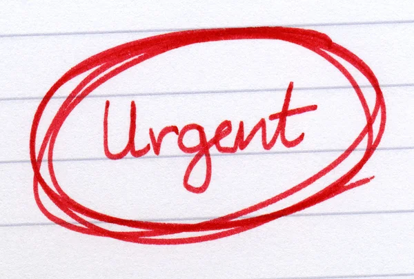 Urgente cerchiato con inchiostro rosso . — Foto Stock